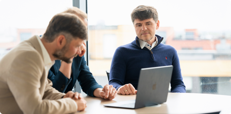 Hive5 colleagues collaborating in a modern office